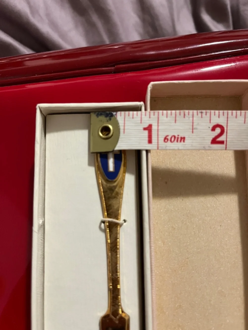 Vintage Gold Letter Opener with Blue and White Cross Emblem